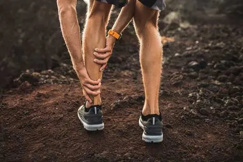 male runner holding injured calf muscle and suffer 2022 11 11 19 26 13 utc